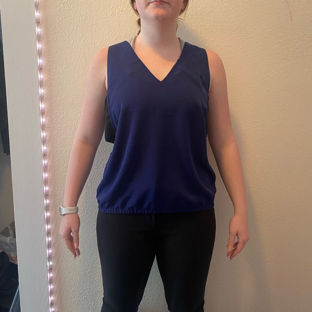 Express cutout side sleeveless blouse